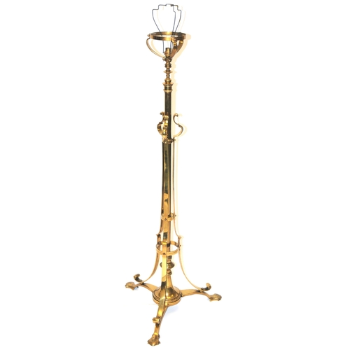 846A - An Arts and Crafts brass standard lamp