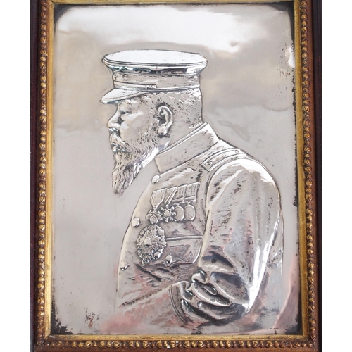 86 - A silver repousse profile portrait of The Meiji Emperor circa 1900