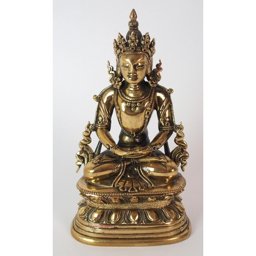 90 - A Chinese gilt bronze Buddha