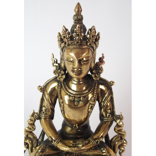 90 - A Chinese gilt bronze Buddha