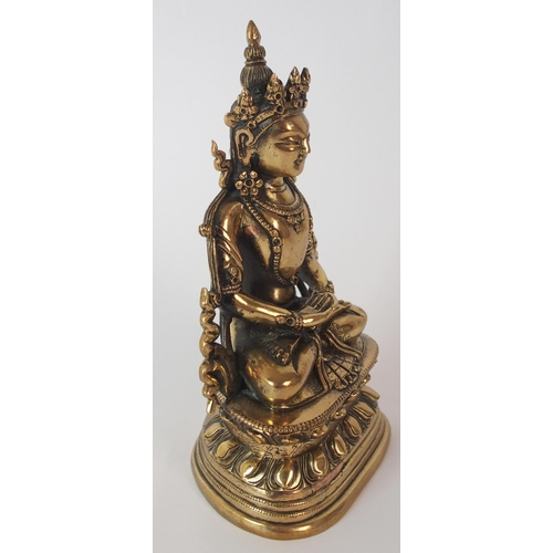 90 - A Chinese gilt bronze Buddha