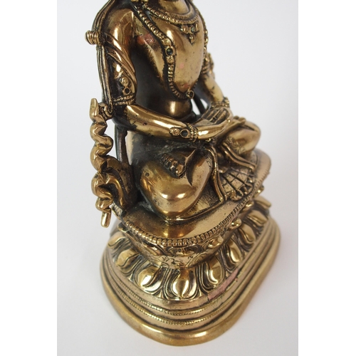 90 - A Chinese gilt bronze Buddha