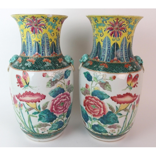 93 - A pair of Chinese famille rose/verte vases