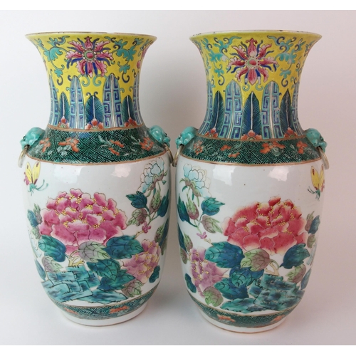 93 - A pair of Chinese famille rose/verte vases