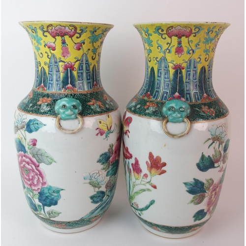 93 - A pair of Chinese famille rose/verte vases