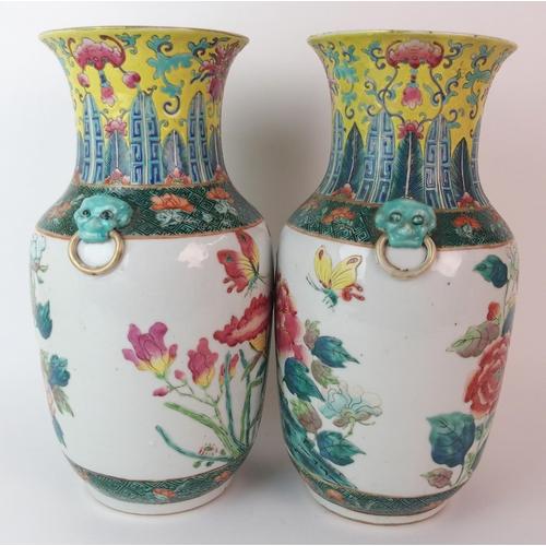 93 - A pair of Chinese famille rose/verte vases