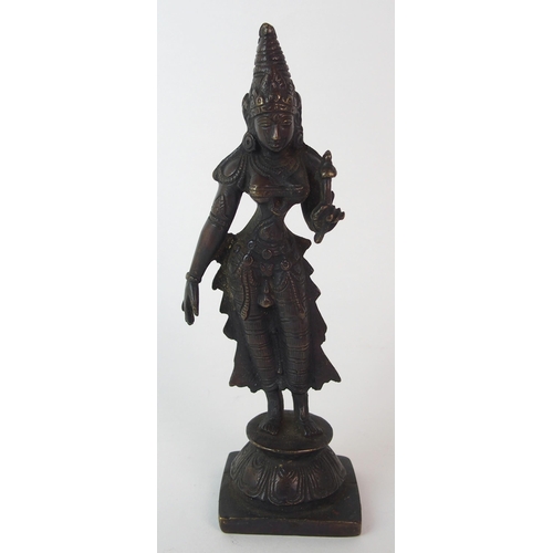 95 - A Burmese bronze devotional figure holding a sceptre