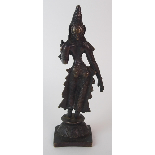 95 - A Burmese bronze devotional figure holding a sceptre