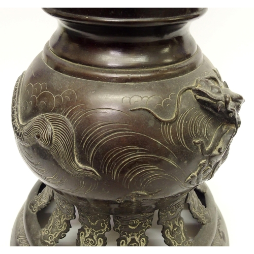 11 - A large Japanese bronze oil lamp