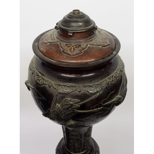 11 - A large Japanese bronze oil lamp