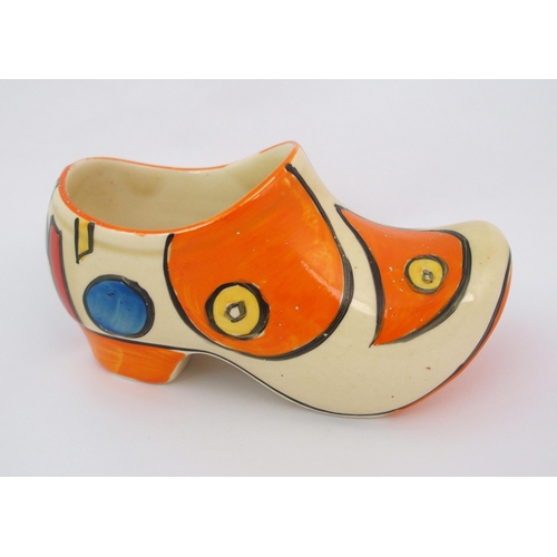 159 - A Clarice Cliff Bizarre Orange Battle pattern porcelain clog