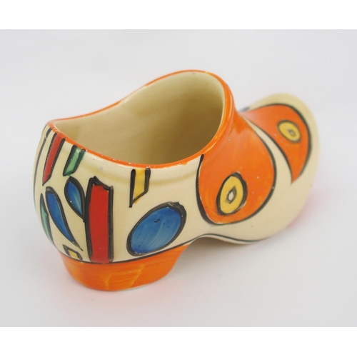 159 - A Clarice Cliff Bizarre Orange Battle pattern porcelain clog