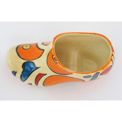 159 - A Clarice Cliff Bizarre Orange Battle pattern porcelain clog