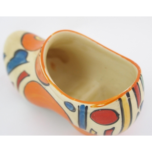 159 - A Clarice Cliff Bizarre Orange Battle pattern porcelain clog