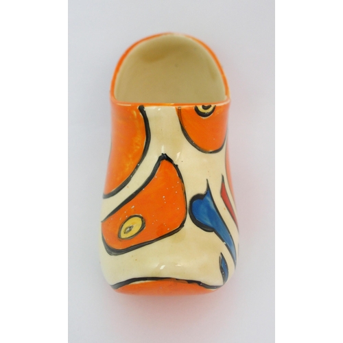 159 - A Clarice Cliff Bizarre Orange Battle pattern porcelain clog