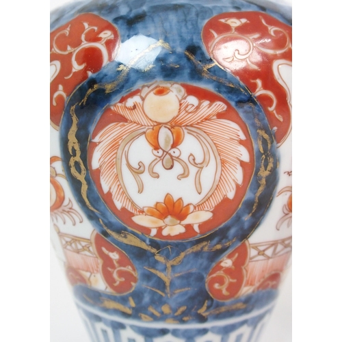 16 - A pair of Imari baluster vases  covers and liners