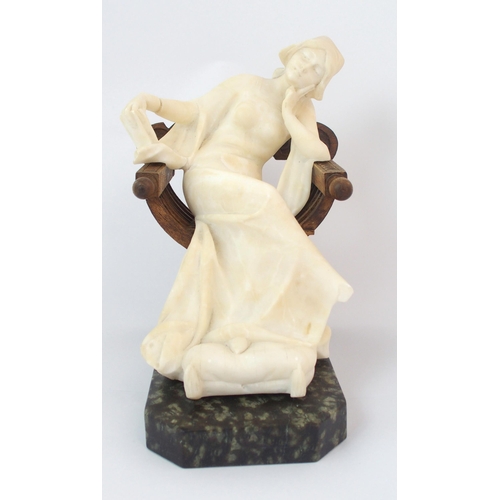 161 - An Italian carved alabaster figural sculpture