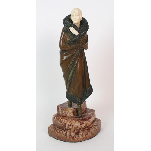 169 - An Art Deco patinated bronze and ivory figure  by Demetre Chiparus (Romania  1886-1947)  Leaving the... 