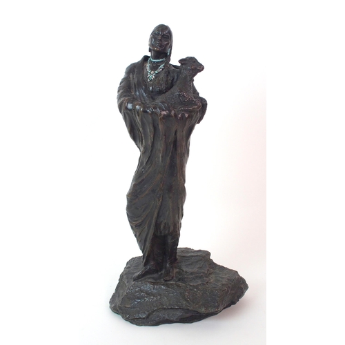 176 - An American patinated cast bronze figure of a Native American woman