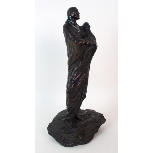 176 - An American patinated cast bronze figure of a Native American woman