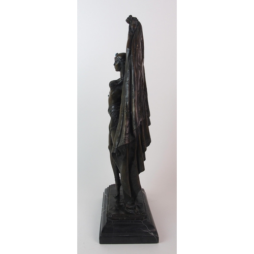 180 - An Orientalist patinated cast bronze figure of a dancer