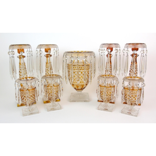 195 - A suite of Bohemian-style cut glass table articles