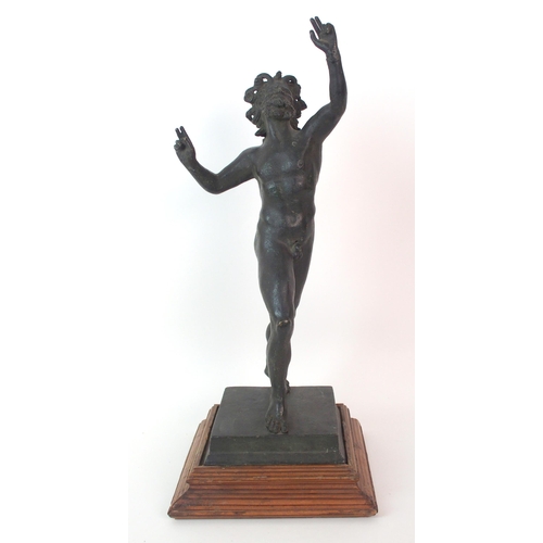 197 - A patinated cast bronze figure of a saytr