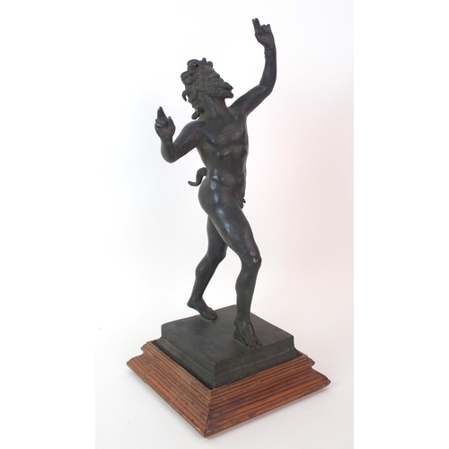 197 - A patinated cast bronze figure of a saytr