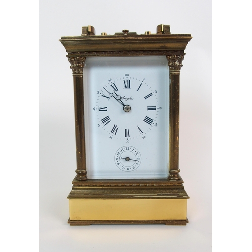 200 - A French two-dial brass carriage clock