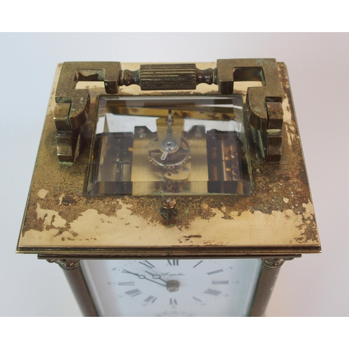 200 - A French two-dial brass carriage clock