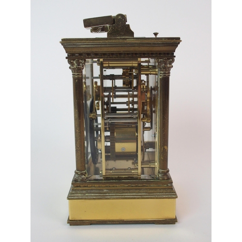 200 - A French two-dial brass carriage clock