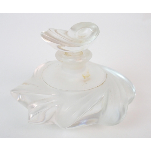 206 - A Lalique moulded glass Samoa perfume bottle and a cut glass atomizer