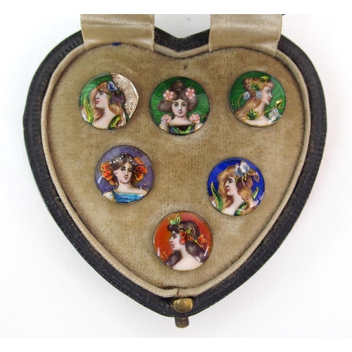 209 - Six enamelled buttons in original case