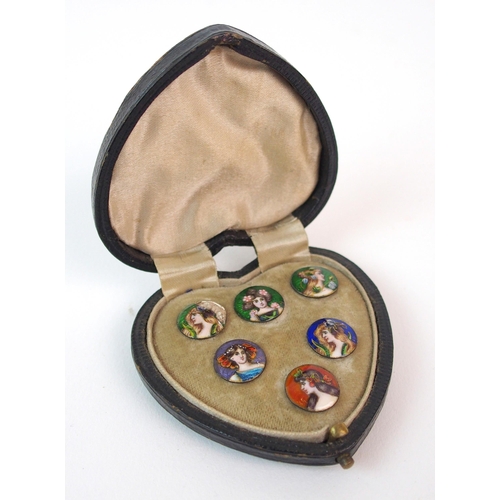 209 - Six enamelled buttons in original case