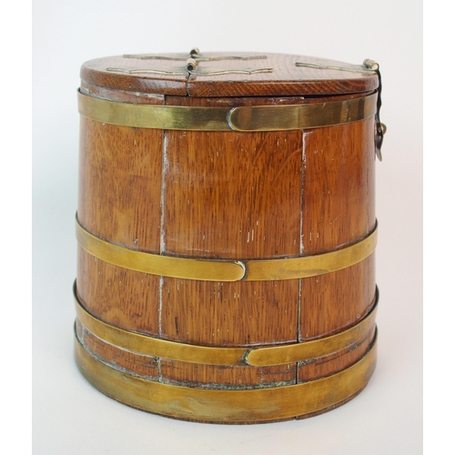 211 - An oak and brass bound lidded box