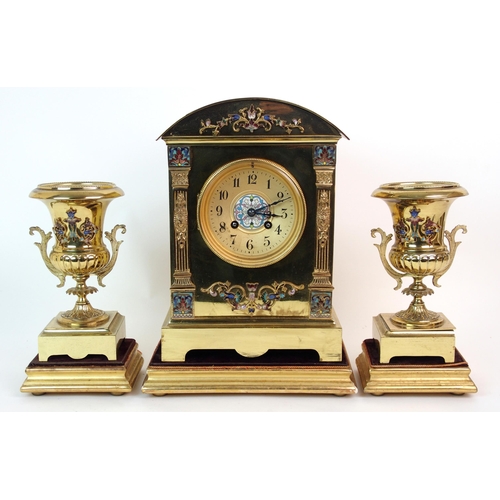 213 - A French brass and enamelled three-piece clock garniture