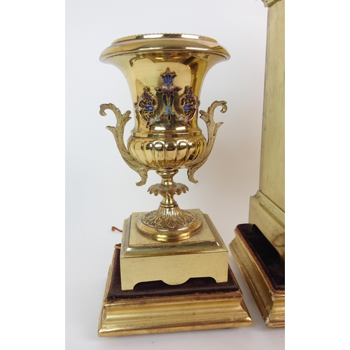 213 - A French brass and enamelled three-piece clock garniture