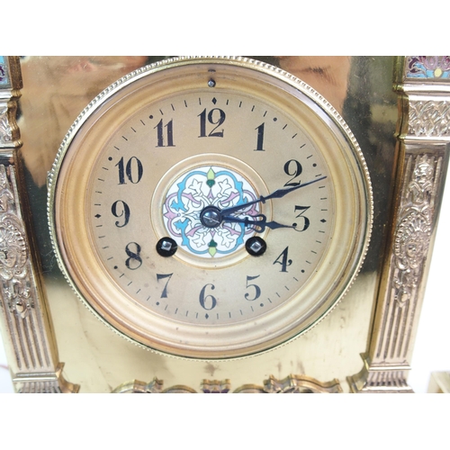 213 - A French brass and enamelled three-piece clock garniture