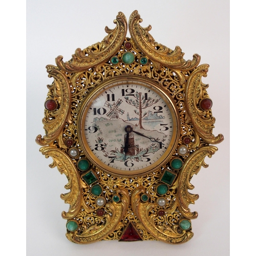 214 - A French Brevete gilt metal filigree clock and associated mirrored compact