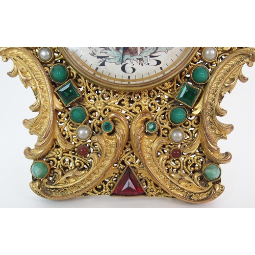 214 - A French Brevete gilt metal filigree clock and associated mirrored compact