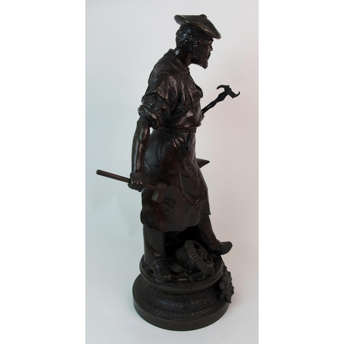 215 - A patinated cast spelter figure