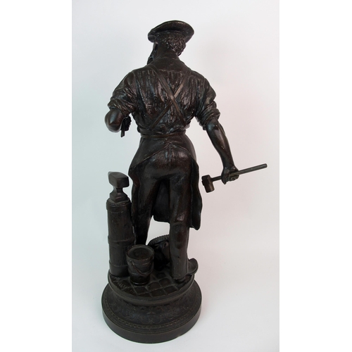 215 - A patinated cast spelter figure