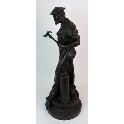 215 - A patinated cast spelter figure