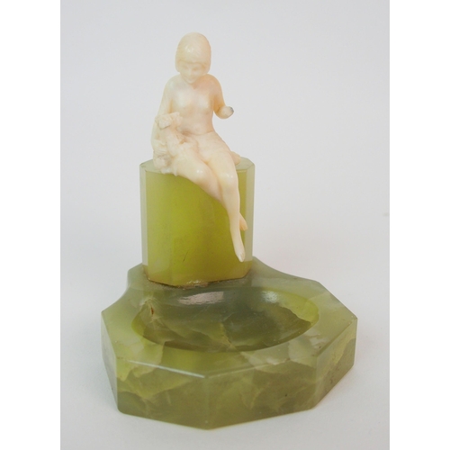 217 - An Art Deco ivory figure on green onyx base  attributed to Ferdinand Preiss (German  1883-1983)