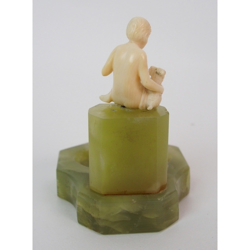 217 - An Art Deco ivory figure on green onyx base  attributed to Ferdinand Preiss (German  1883-1983)