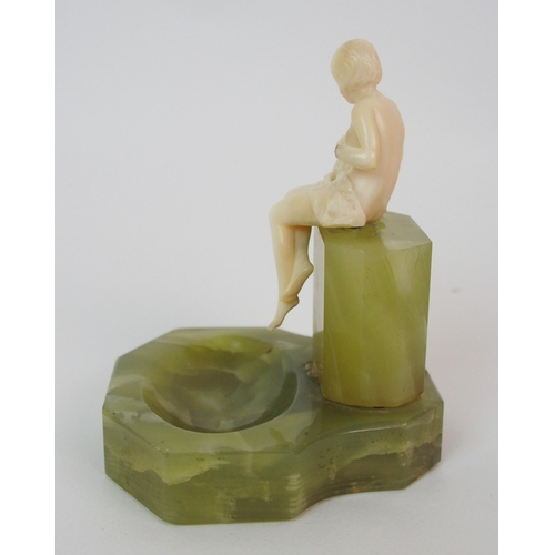 217 - An Art Deco ivory figure on green onyx base  attributed to Ferdinand Preiss (German  1883-1983)