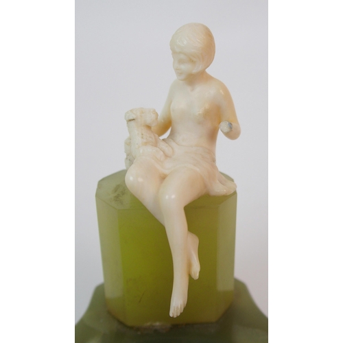 217 - An Art Deco ivory figure on green onyx base  attributed to Ferdinand Preiss (German  1883-1983)