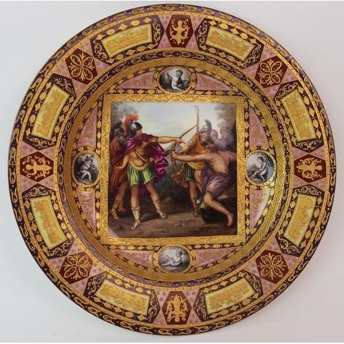 221 - A Viennese painted and enamelled porcelain cabinet plate