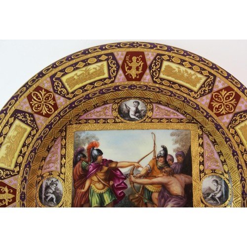 221 - A Viennese painted and enamelled porcelain cabinet plate