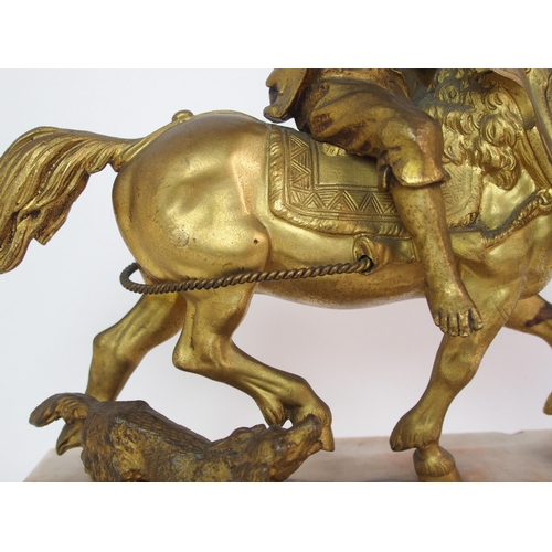 224 - A Continental gilt bronze figure of a boy on horseback